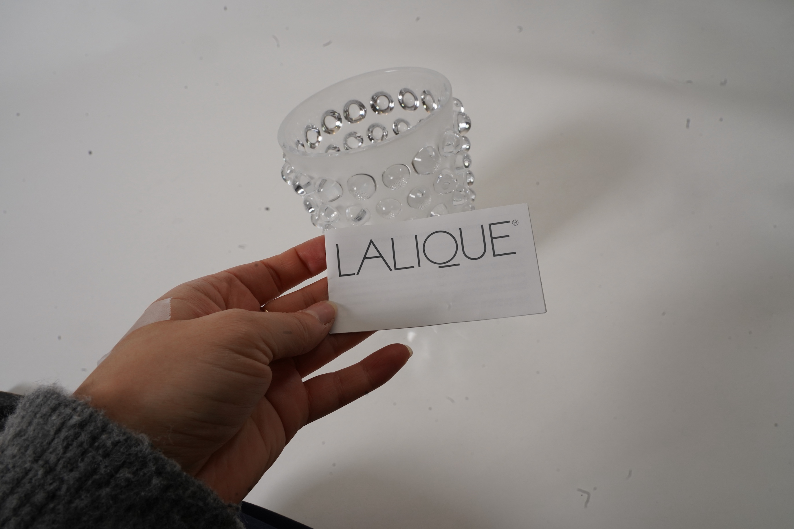 Lalique, France: A clear and frosted glass 'Mossi' vase